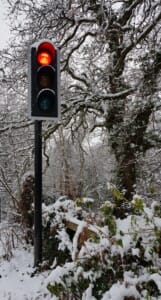 Mytchett - Traffic signal on a snowy morning by Peter Loveland